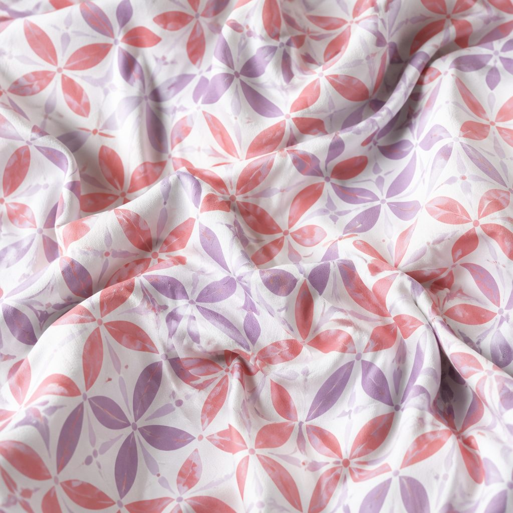 Fabric mockup generator preview of a seamless floral on folded linen